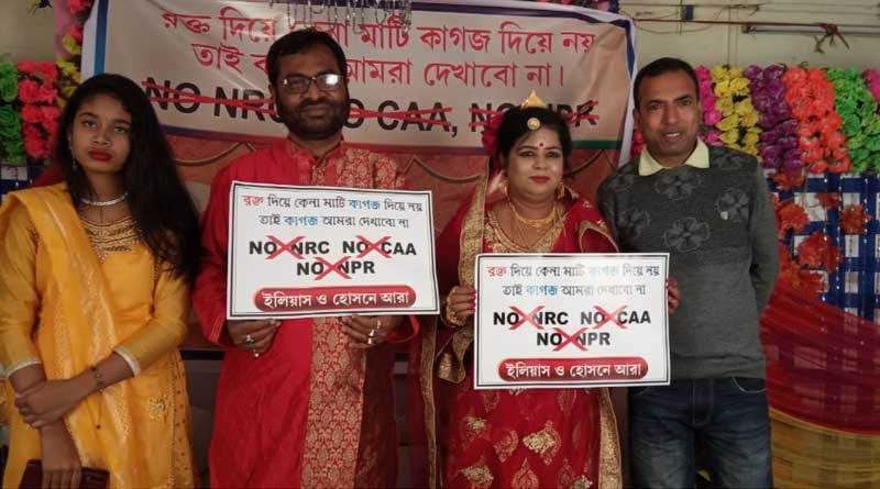 Couple decorates marriage hall with anti CAA posters