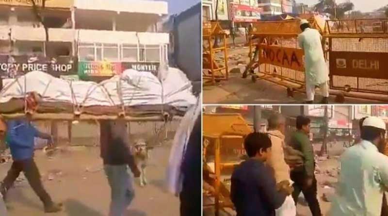 Shaheen Bagh protesters open barricades for Hindu funeral procession.