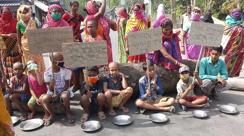 People in a village of Basirhat stage protest for having no food in lockdown