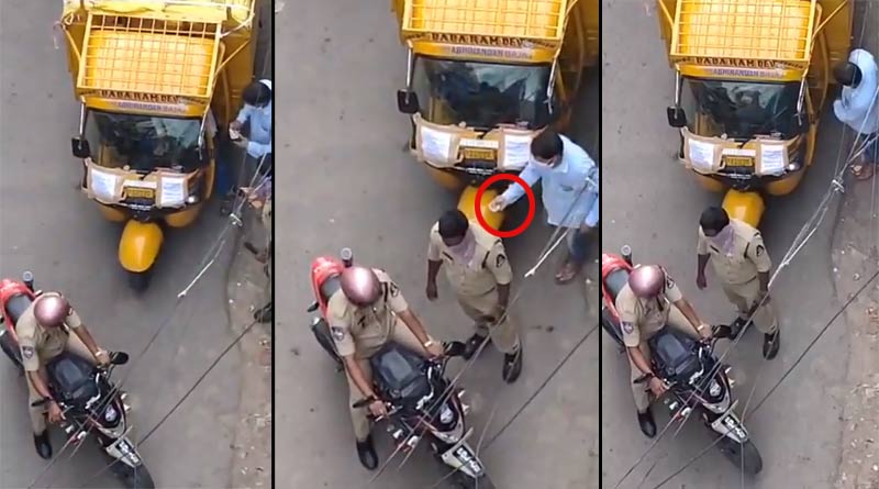 রাস্তায় দাঁড়িয়ে অটোচালকের থেকে ঘুষ নিল ২ পুলিশকর্মী! নেটদুনিয়ায় ভাইরাল ভিডিও