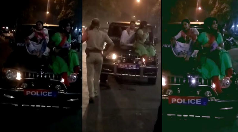 পানশালায় তাণ্ডব, পুলিশের গাড়ির বনেটে চড়ে মাতলামি, পাকড়াও ২ লাস্যময়ী
