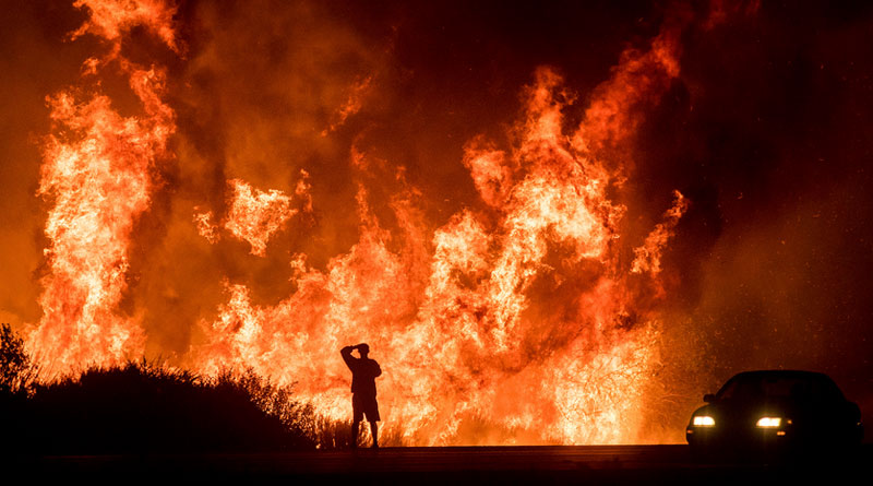 Fire crews battle to tame Southern California wildfire after thousands flee। Sangbad Pratidin