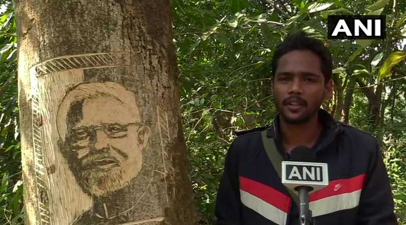 গাছের গায়ে ফুটে উঠল প্রধানমন্ত্রীর মুখ, মোদিকে কী বার্তা দিলেন ওড়িশার শিল্পী?