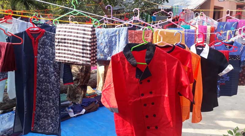 Left front arranges winter cloth market for poor people | Sangbad Pratidin