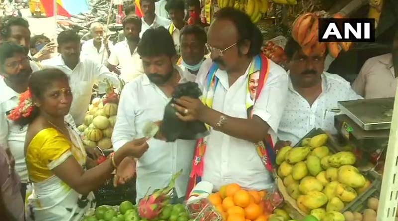 Tamil Nadu Assembly election 2021: PMK candidate against Udhayanidhi Stalin selling mangoes to woo voters | Sangbad Pratidin