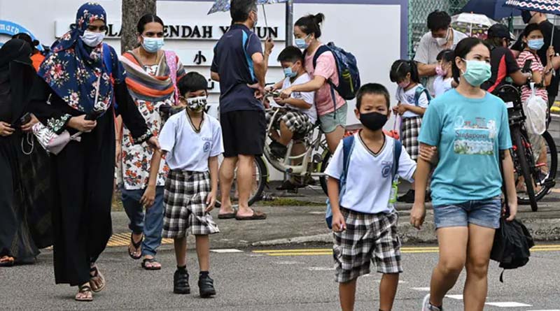 Singapore warns new corona virus strains infecting more children, shuts schools | Sangbad Pratidin