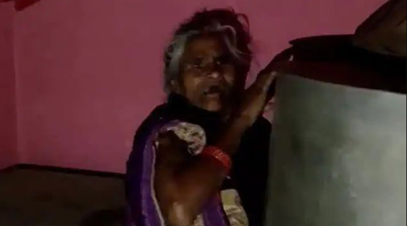 করোনার টিকা নিতে আতঙ্ক, ড্রামের পিছনে লুকোলেন বৃদ্ধা! ভিডিও ভাইরাল
