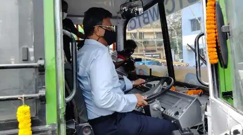 Transport minister Firhad Hakim drives CNG run bus on Kolkata road | Sangbad Pratidin