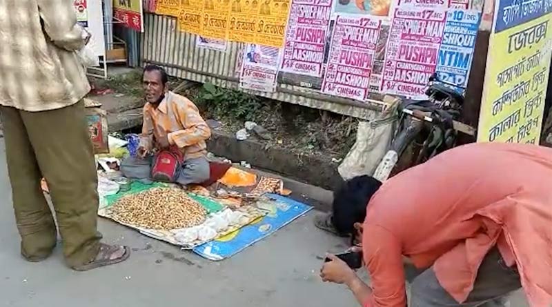 Jalpaiguri's nut seller Gurupada Sarkar becomes viral with his 'vaja badam' song । Sangbad Pratidin