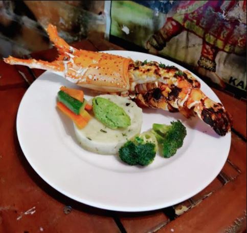Big boss (grilled lobster with pea mash)