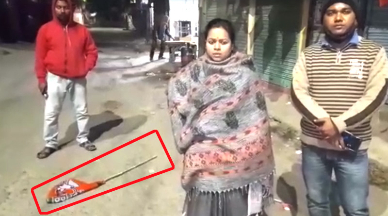 বালুরঘাটে রাজনৈতিক সৌজন্য! মাটিতে পড়ে থাকা বিজেপির পতাকা উদ্ধারে তৎপর TMC প্রার্থী