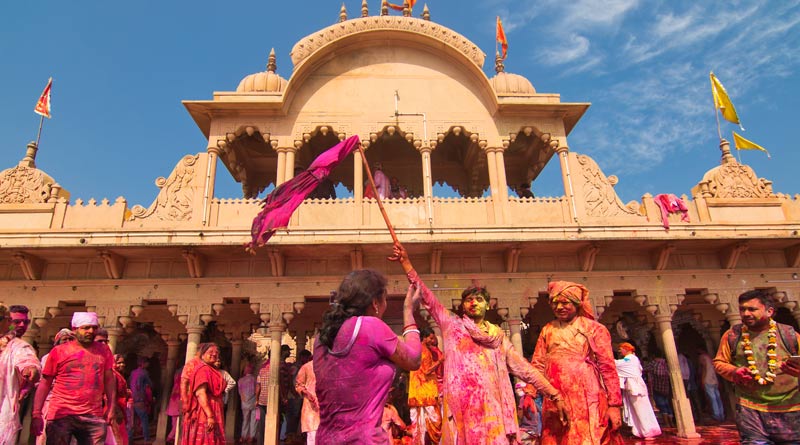 Barsana and Nandgaon is one of the most popular Holi traditions। Sangbad Pratidin
