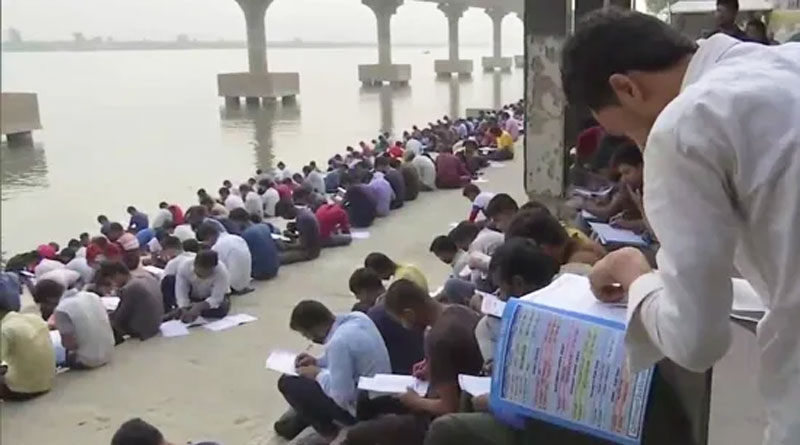 Bihar students gather Bank of Ganges to study for govt jobs | Sangbad Pratidin