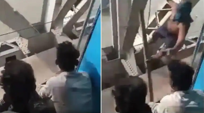 দেখুন ভিডিও, চোখের পলকে ট্রেন যাত্রীর ফোন ছিনিয়ে নিল ব্রিজে ঝুলে থাকা ‘স্পাইডারম্যান’!