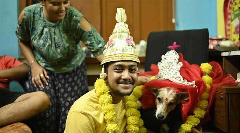 A youth get married with a dog, photo goes viral | Sangbad Pratidin