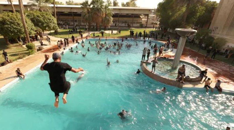 Protestors storm presidential palace in Baghdad, take dips in pool। Sangbad Pratidin