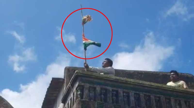 BJP flag above Tricolour! Purulia BJP leader in bog | Sangbad Pratidin