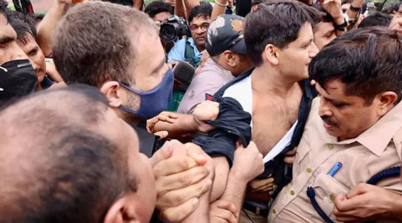 BJP says Congress leader Rahul Gandhi tore party leader's shirt during protest। Sangbad Pratidin