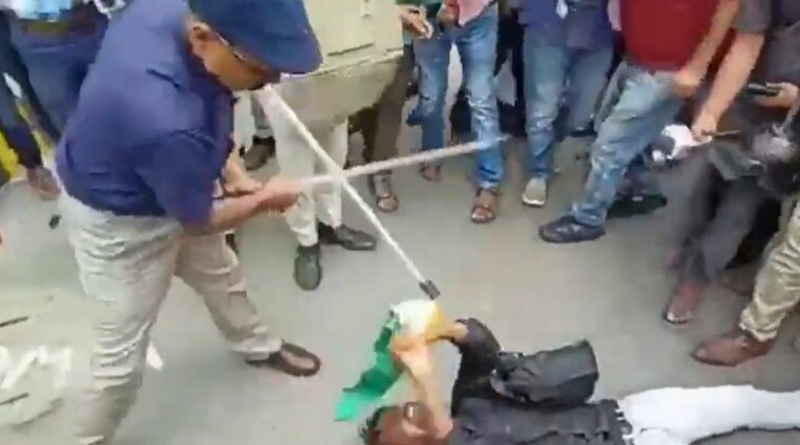 DM thrashed protestor carrying national flag in Patna | Sangbad Pratidin