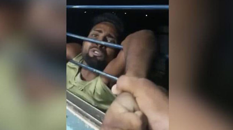 Snatcher hanging outside a window of a moving train in Bihar, video goes viral। Sangbad Pratidin