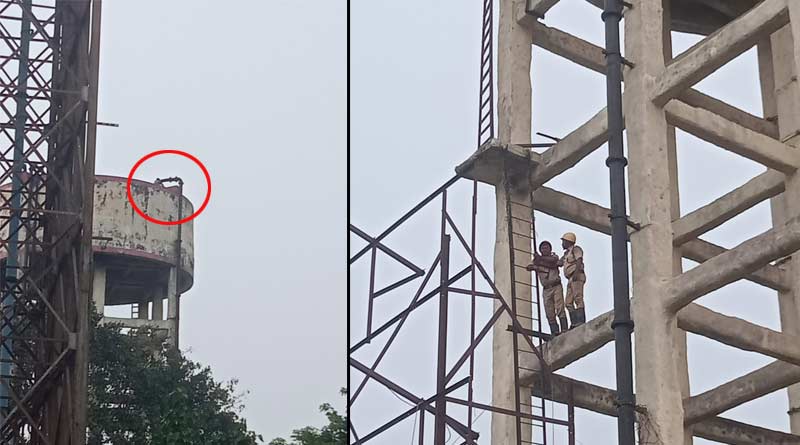 Man climbed on 90 feet tall water tank in Howrah, Police trying to bring him down | Sangbad Pratidin