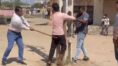 Gujarat Men flogged publicly for pelting stones at Garba event | Sangbad Pratidin