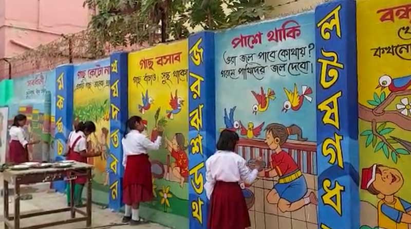 Maldah Students paint walls of school and bring prior feeling of Holi | Sangbad Pratidin
