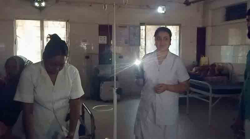 Sainthia Hospital suffering from power cut, treatment goes under torch light | Sangbad Pratidin