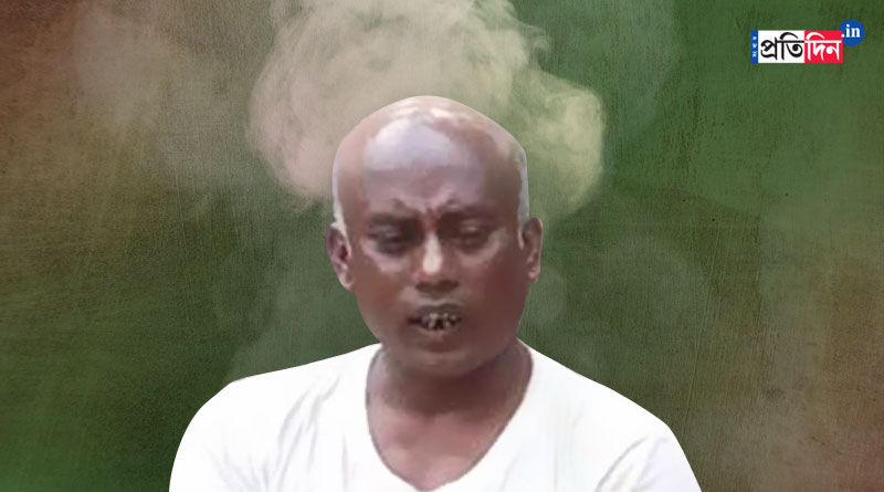 Bangladesh man eats betel leaf and smokes from head | Sangbad Pratidin
