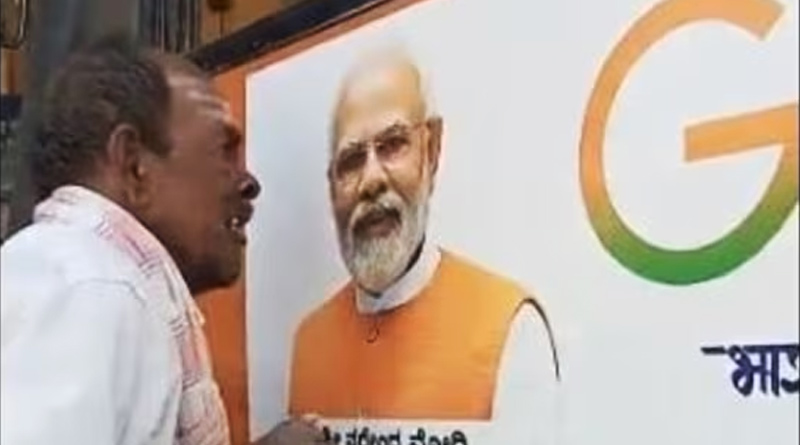 Karnataka farmer kisses PM Modi's pic, video goes viral | Sangbad Pratidin
