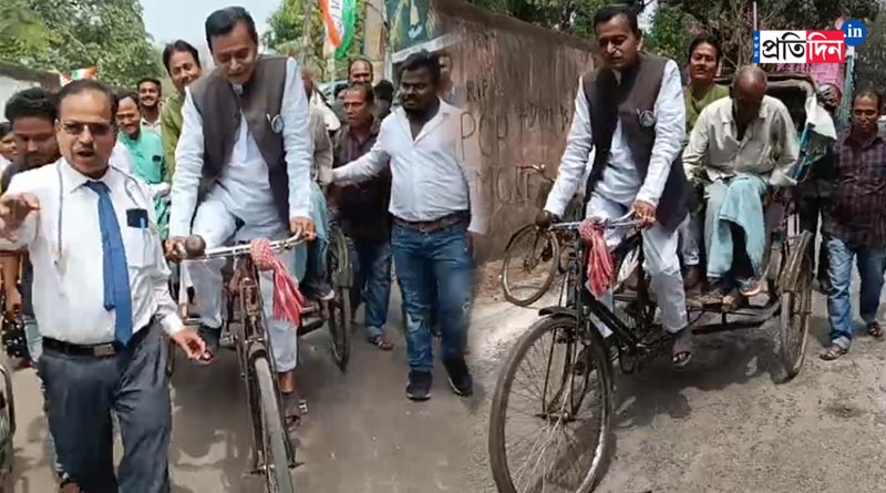 West Bengal Minister carrying elderly man in Rikshaw | Sangbad Pratidin