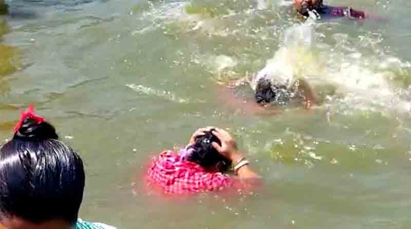 Diving in Habra pond will fulfil all the wishes, locals believe so | Sangbad Pratidin