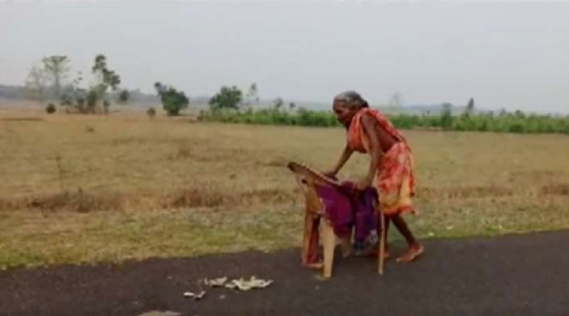 Odisha old woman walks with chair in scorching heat for denied pension, Finance Minister tweets | Sangbad Pratidin