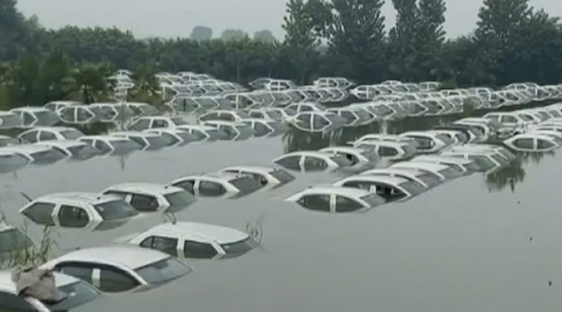 Over 200 cars submerged in Greater Noida। Sangbad Pratidin