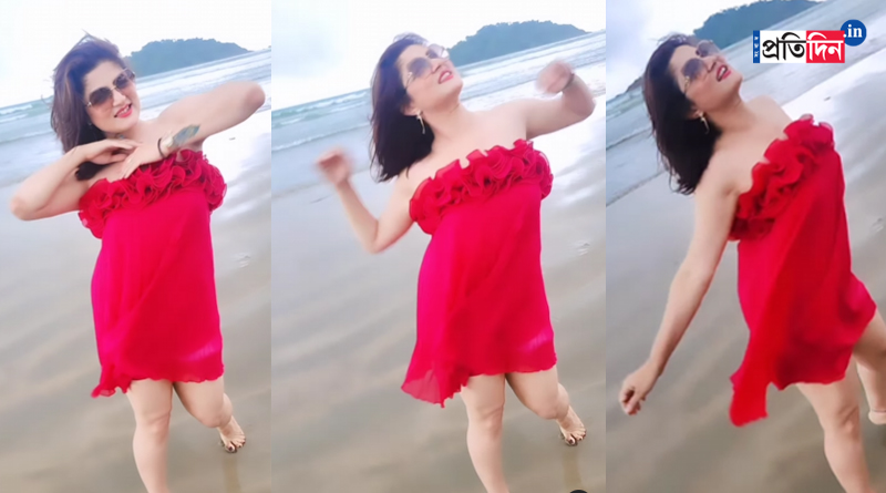 Srabanti Chatterjee in red dress at sea beach | Sangbad Pratidin