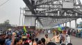 Howrah bridge blocked due to procession of tribal organizations | Sangbad Pratidin