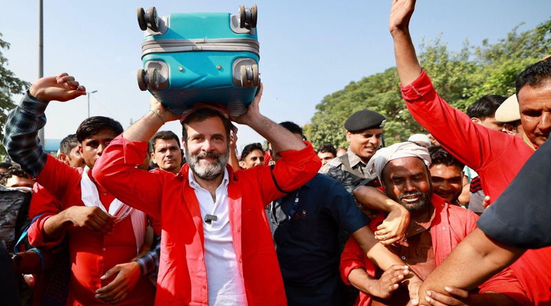 Rahul Gandhi turns coolie, carries suitcase in Delhi | Sangbad Pratidin