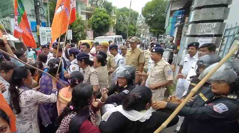 Woman BJP leader bites police Hooghly | Sangbad Pratidin
