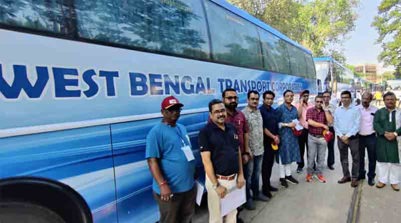 Nabanna painted Durga Puja Visiting Bus with blue and white | Sangbad Pratidin