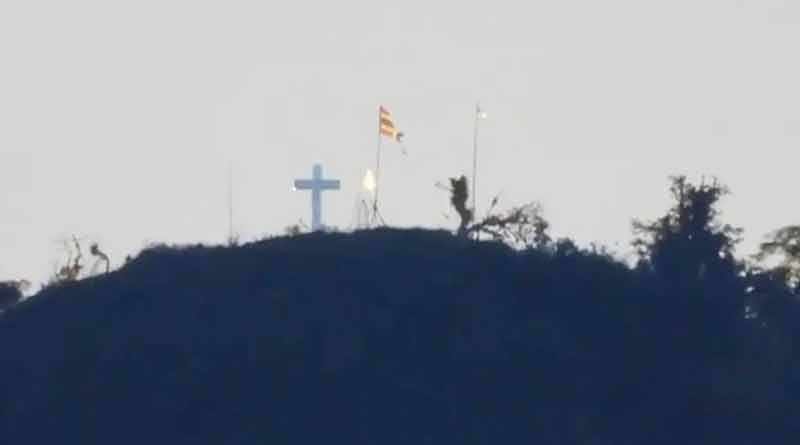 Row over cross and flag atop Manipur's hill। Sangbad Pratidin