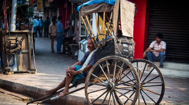 hand-pulling-rickshaw-1