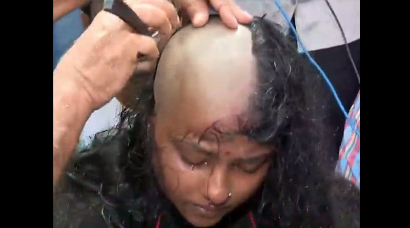 SLST Scam Protest: Female protestor shaves hair in Kolkata