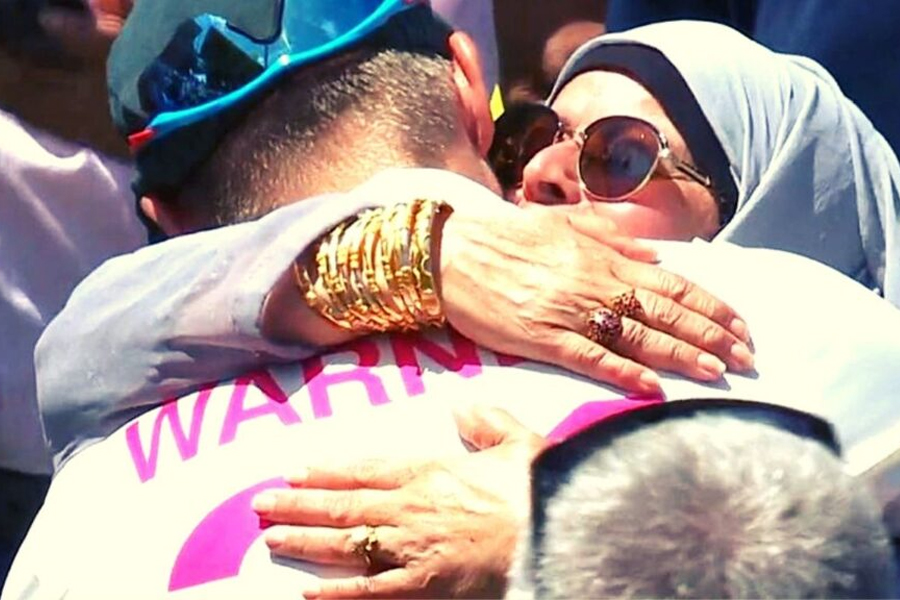 David Warner hugs Usman Khawaja's mother after Sydney test । Sangbad Pratidin