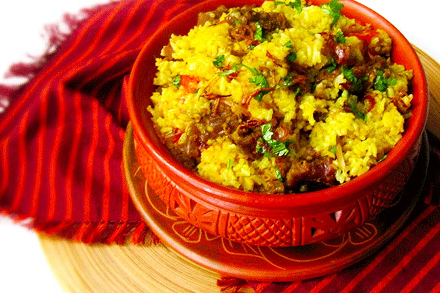 Murgir Bhuna Khichudi recipe | Sangbad Pratidin