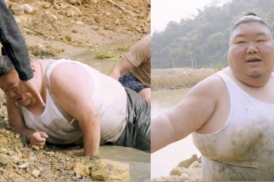Viral Video: Nagaland minister’s struggle to get out of muddy pond after falling | Sangbad Pratidin