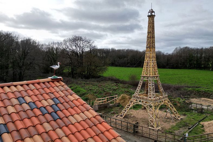 Two friends build Eiffel Tower from recycled wood