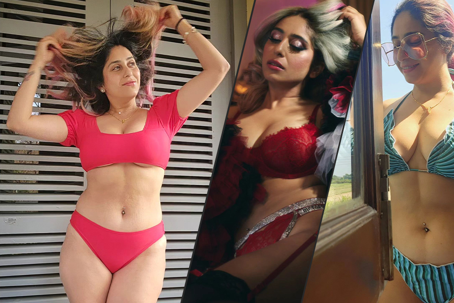চোলি কে পিছে! চৈত্রের গরমে গায়িকা নেহার নাভিতে দুলের ঝলকানি, নিতম্বের নিচে ট্যাটু
