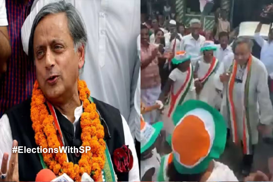 Shashi Tharoor dance with children while campaigning