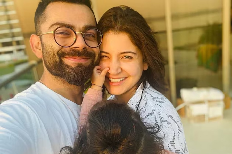 Anushka Sharma Returns To India with Son Akaay, Offers Paps a Glimpse