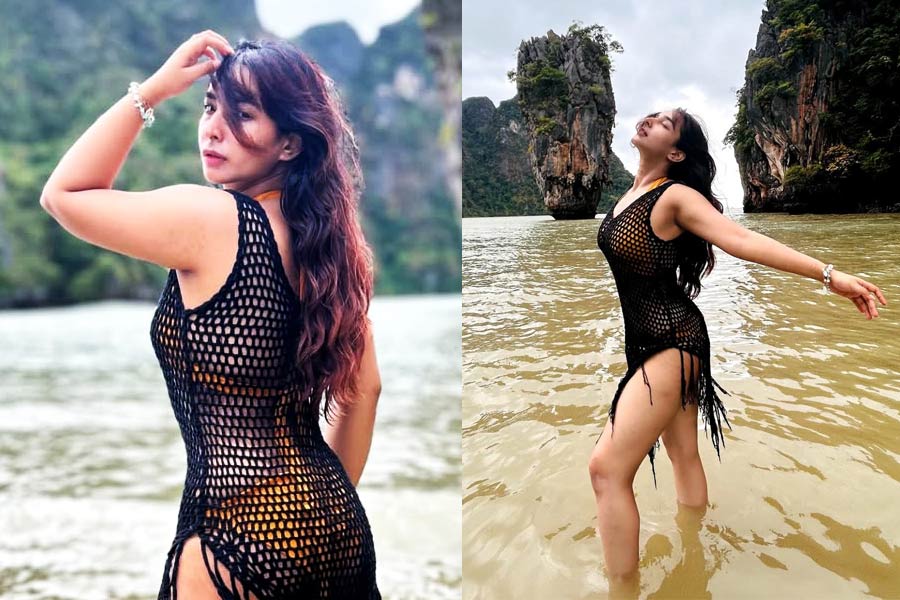 কালো নেটপোশাক থেকে উঁকি দিচ্ছে গেরুয়া বিকিনি, সৃজলার দুষ্টু ‘আশকারা’